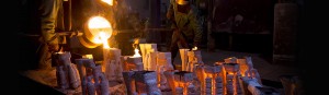 PPCP employees pouring molten metal into molds